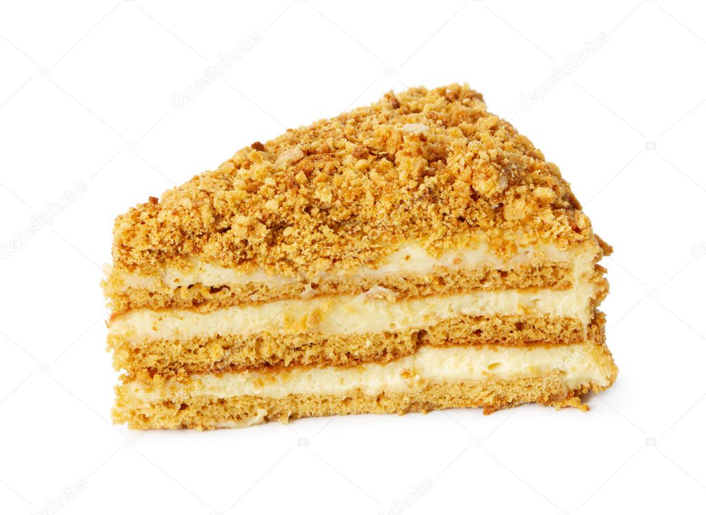 Piece of honey cake isolated on white background.