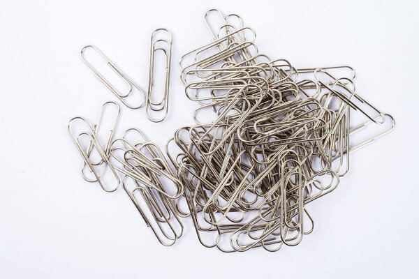 Paperclip spread around on white background