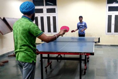 Rohtak, Haryana, India - 10 October, 2018:Two Friends Playing Tabletennis Concept