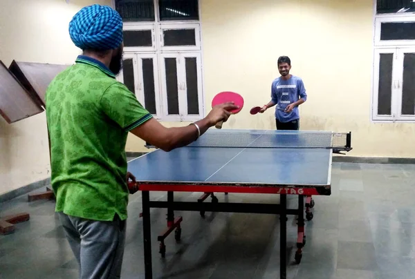 Rohtak, Haryana, India - 10 October, 2018:Two Friends Playing Tabletennis Concept