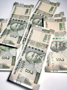 Group of Five Hundred Rupees Note isolated in a White Background