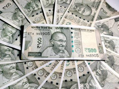 Group of Five Hundred Rupees Note isolated in a White Background