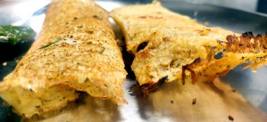 Paper Masala dosa sambhar ve chutney ile servis edilen bir Güney Hindistan yemeğidir. Seçici odak