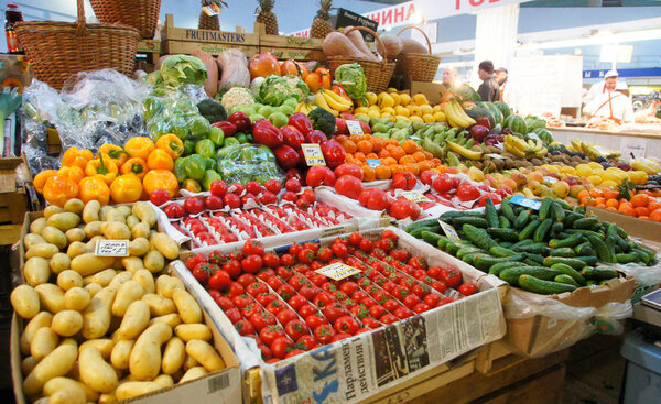 MOSCOW, RUSSIA - November 09, 2012: A table with vegetables and fruits. District food agricultural market in Moscow.