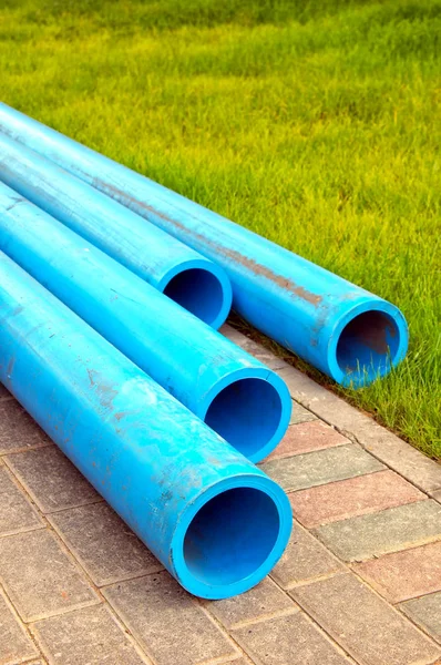 Plastic Water Pipes Stone Walkway — Stock Photo, Image