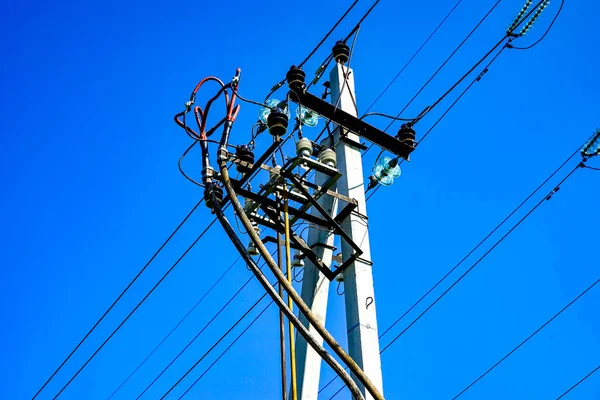 Power Line Concrete Electric Poles Wires Bright Blue Sky — Stock Photo, Image