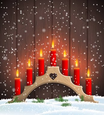 Kırmızı mumlar ile geleneksel Noel ahşap şamdan