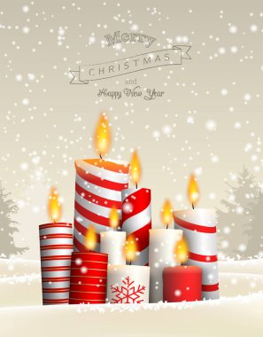 Karlı manzarada grup Noel mumlar