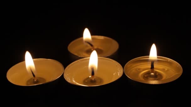 Four Burning Candles Christmas Candles Burn Dark Focus Foreground Candles — Stock Video