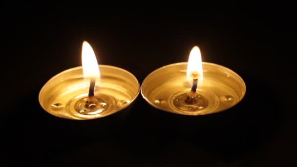 Two Burning Candles Christmas Candles Burn Dark — Stock Video