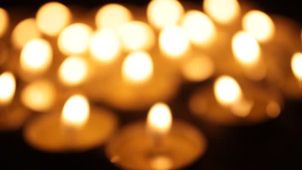 Burning Candles Out Focus Background Lots Christmas Candles Bokeh — Stock Video