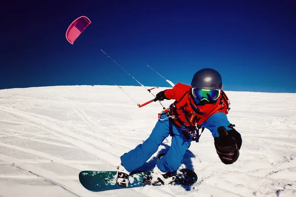 Snowboardista s kite — Stock fotografie
