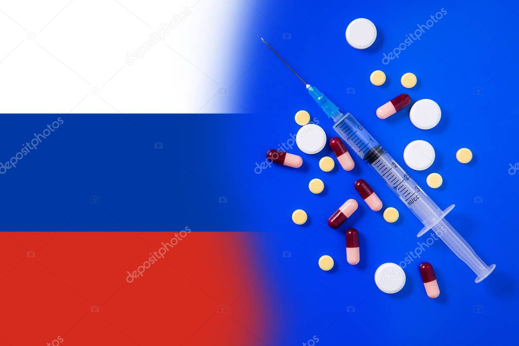 Medical syringe with doping against the background of the flag of Russia. Concept of doping in sport