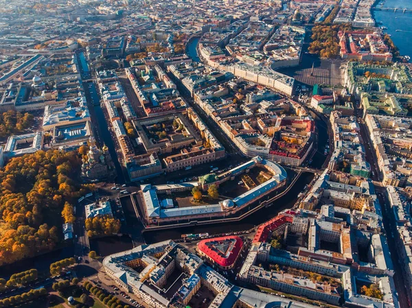Urban area, main streets and attractions of St. Petersburg. Autumn Sunny day. Top view aerial drone.