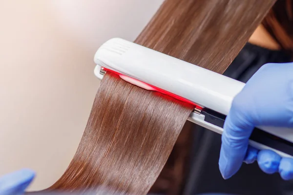 Keratin recovery hair and protein treatment pile with professional ultrasonic iron tool — Stock Photo, Image