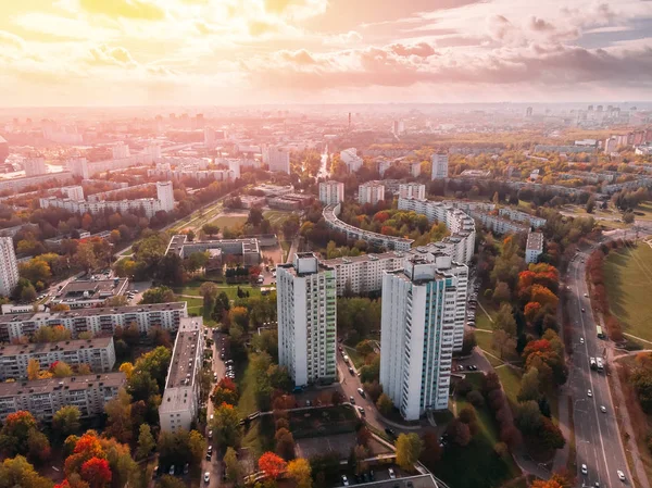 Aesthetics multi-storey apartments mixed with autumn yellowing trees. Minsk, Republic of Belarus. view aerial drone