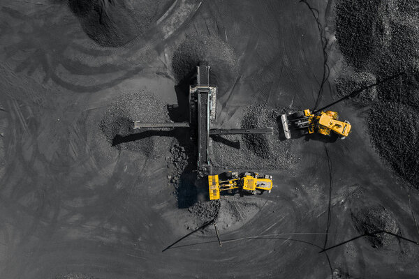 Open pit mine, extractive industry for coal, top view aerial drone
