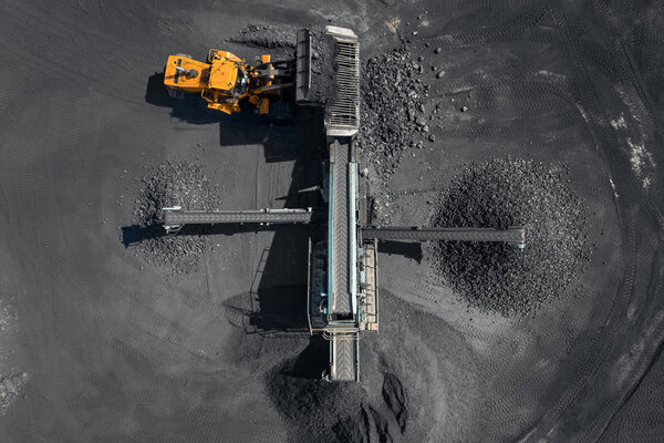 Open pit mine, extractive industry for coal, top view aerial drone