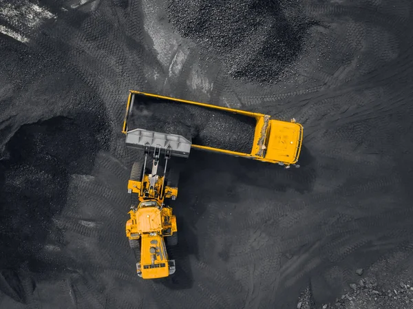 Open pit mine, coal loading in trucks, transportation and logistics, top view aerial drone — Stock Photo, Image