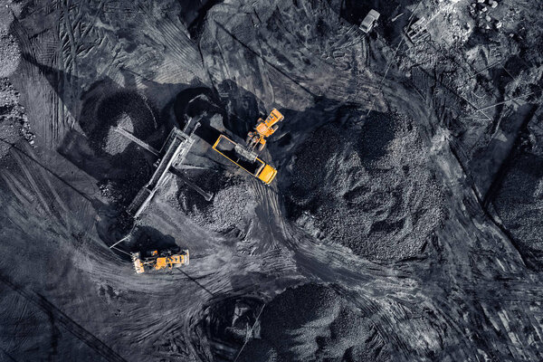 Open pit mine, extractive industry for coal, top view aerial drone