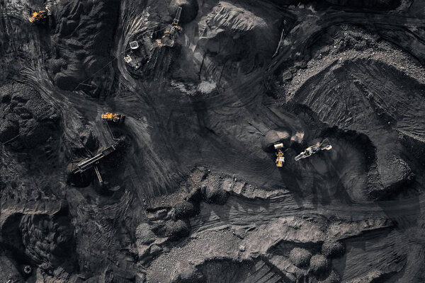 Open pit mine, extractive industry for coal, top view aerial drone