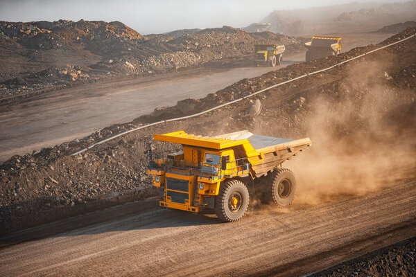 Open pit mine industry, big yellow mining truck for coal anthracite