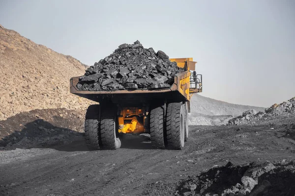 Open pit mine industry, big yellow mining truck for coal anthracite