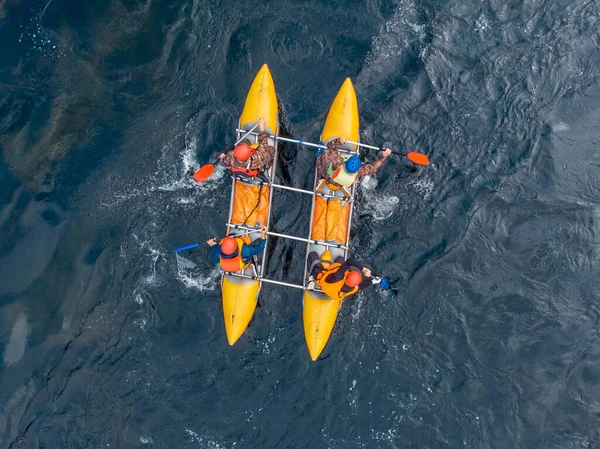 Guy in kayak sails mountain river. Whitewater kayaking, extreme sport rafting. Aerial top view — Stock Photo, Image