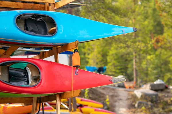 Color kayaks for rafting on tropical mountain river — Stock Photo, Image