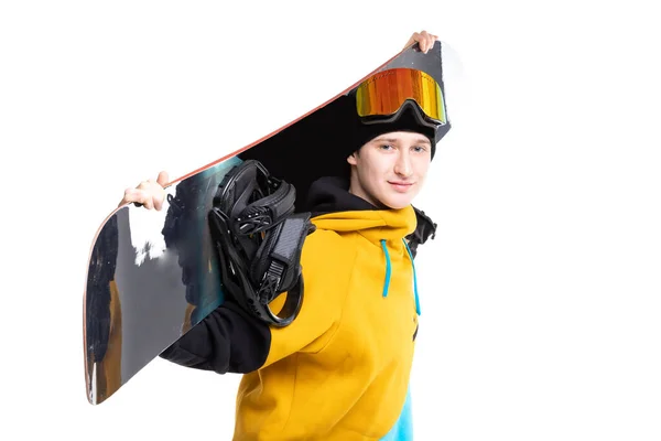 Maschio snowboarder tiene snowboard su sfondo bianco isolato — Foto Stock