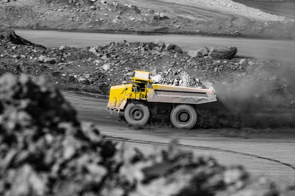 Big yellow mining truck for coal move. Open pit mine industry