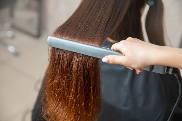 Concept lamination, lifting. Keratin recovery hair and protein treatment pile with professional ultrasonic iron tool — Stock Photo, Image