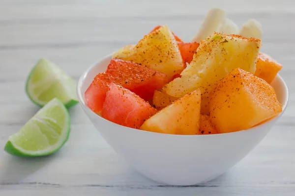fruta con chile, mexican snack, Bowl of healthy fresh fruit salad