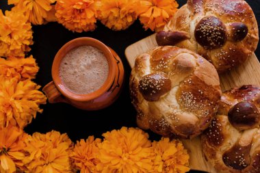 Pan de Muerto, mexican Sweet bread in Day of the Dead celebration in Mexico clipart