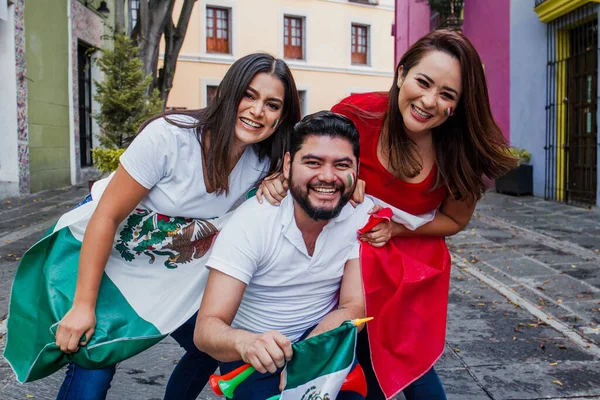 Mexican people with flag in mexican independence day in Mexico