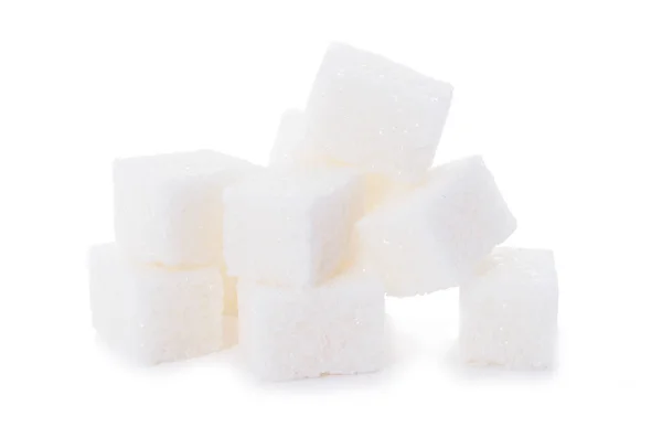 Группа кубиков сахара на белом фоне — стоковое фото