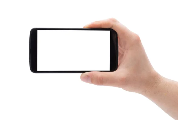 Um homem mão segurando telefone inteligente fazendo foto isolada no fundo branco . — Fotografia de Stock