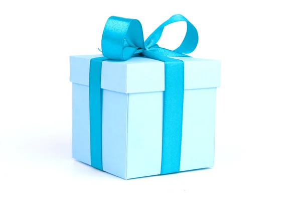 Gift Box With Blue Ribbon Bow Isolated On Blue Background Stock Photo -  Download Image Now - iStock
