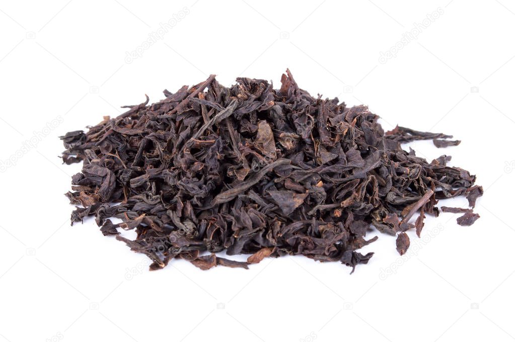 Black tea dried leaves isolated on white background