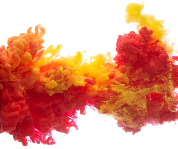 Gele en rode kleurrijke inkt in water abstract — Stockfoto
