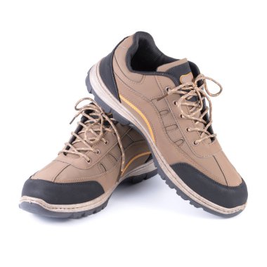 Kahverengi ayakkabılar beyaz arkaplanda izole edilmiş