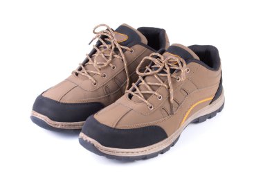 Kahverengi ayakkabılar beyaz arkaplanda izole edilmiş