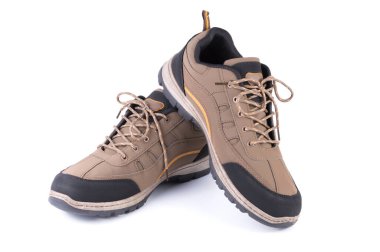 Kahverengi ayakkabılar beyaz arkaplanda izole edilmiş