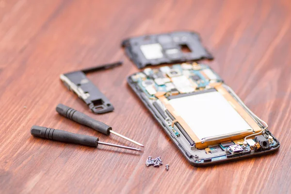 Cell phone repair. Smartphone parts and tools for recovery