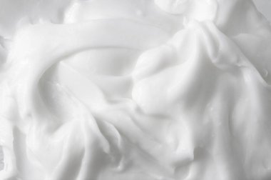 Kozmetik bakım kremi arka planının beyaz dokusu