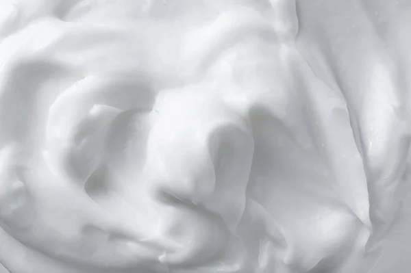 White texture of cosmetic care cream background