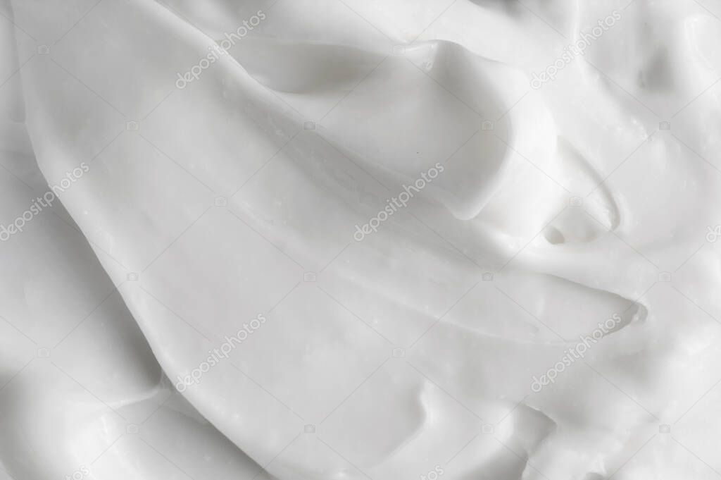 White texture of cosmetic care cream background