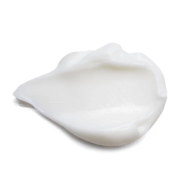 Beyaz arkaplanda izole edilmiş kozmetik krem
