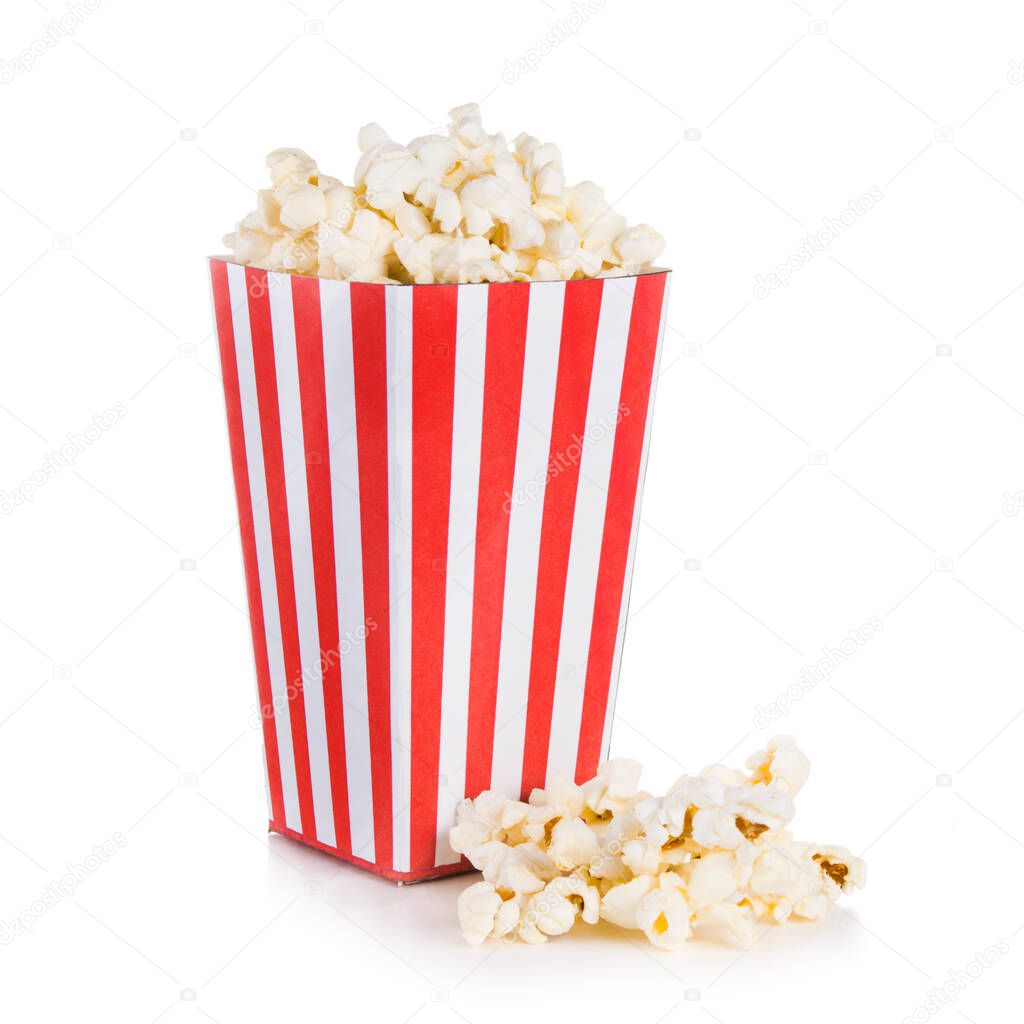 Popcorn spilled from a square box isolated on white background