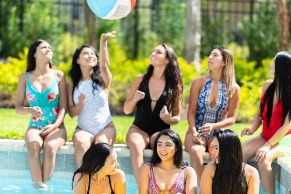 Group of friends at a summer pool party